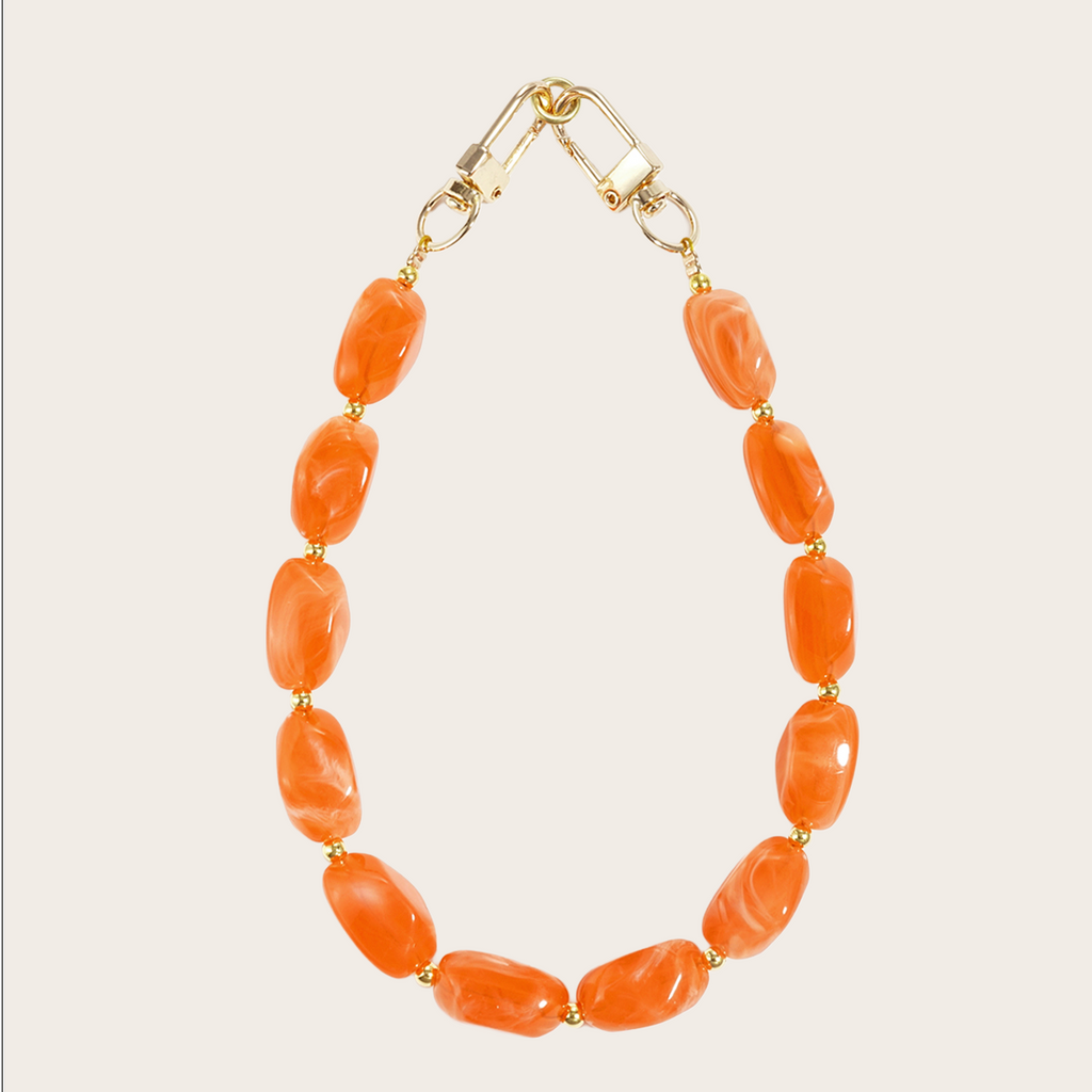 Kort telefoonkoord phonestrap goud met oranje kralen